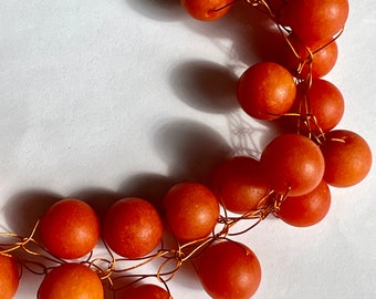 A burst of Orange hand crochet beaded necklace