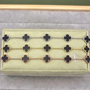 Bransoletka ze srebra próby 925, pozłacana 18-karatowym złotem, z 5 motywami koniczyny, 15 mm Vintage Black Agat Clover Jewelry