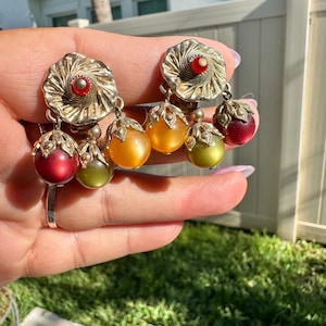 Vintage Napier Opulent moon glow lucite clip on earrings goldtone Stamped Napier Pat. Pending