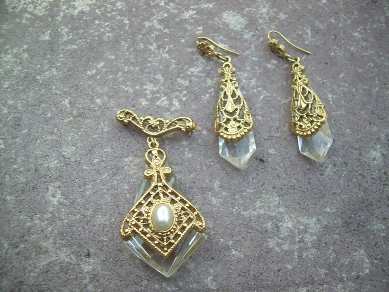 Rare Vintage Ornate Gold tone and rock crystal Earrings and Brooch set in Gold gilt featuring Faux Pearl.