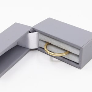 Wedding Band in 9ct Gold – Twist Continuum Ring