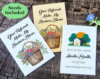 May include: Three seed packets with floral basket illustrations and the text "Your Referrals Make My Business Bloom." One packet is for a real estate agent, with contact information. A green oval reads "Seeds Included."