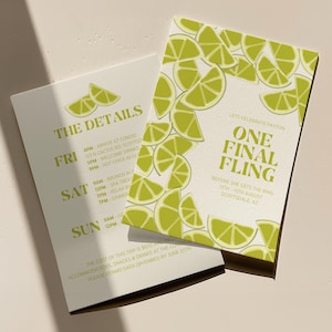 May include: A white card with green lime slices printed on it. The card says "Let's Celebrate Peyton One Final Fling Before She Gets The Ring 13th - 15th August Scottsdale, AZ".