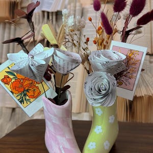Western Charm: Cowboy Boot Vase with Boho Florals made of Recycled Books