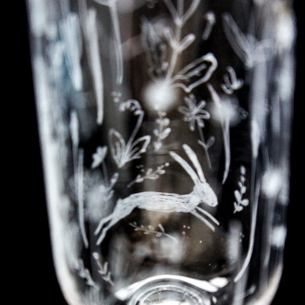 A Pair Of Hand Engraved Bohemia Crystal Champagne Flutes, Hares With Wild Meadow Flowers And Swallows