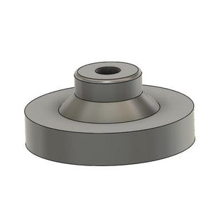 Könnte beinhalten: Ein grauer Kunststoffsockel mit einem erhöhten Mittelteil und einem kleinen Loch oben.