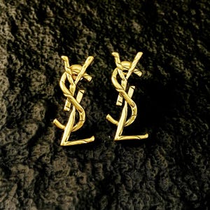 Vintage ysl earrings - Etsy 日本