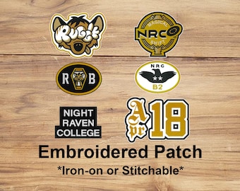 May include: A collection of embroidered patches with various designs and text, including "RUGE", "NRC", "Night Raven College", and "A18". The patches are in black, gold, and white colors. The text "Embroidered Patch" is also present.