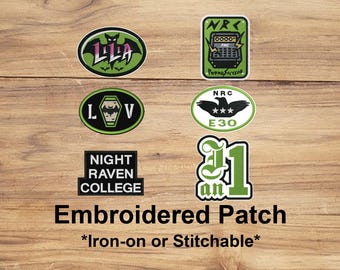 May include: A collection of embroidered patches with various designs and text. The patches include a bat, a coffin, a calculator, a raven, and the text "Night Raven College". The text "Embroidered Patch" and "Iron-on or Stitchable" are also present.