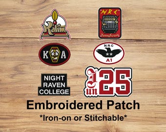 May include: Embroidered patches with various designs, including a radio, a coffin with the letters K and A, and a college logo. The patches are in various colors, including red, black, and white. The text "Embroidered Patch" and "Iron-on or Stitchable" are also visible.