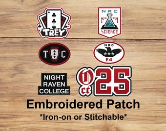 May include: A collection of embroidered patches with various designs. The patches include text and graphics such as a playing card, a science beaker, a raven, and the text "25". The text "Embroidered Patch" is also displayed.