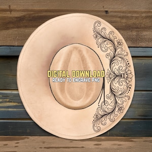 May include: A tan cowboy hat with a decorative floral design on the brim. The hat has a rounded crown and a wide brim. Text on the hat reads "DIGITAL DOWNLOAD READY TO ENGRAVE PNG".