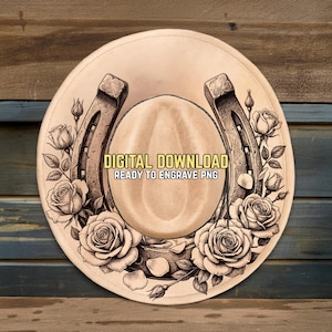 May include: A tan cowboy hat design featuring a horseshoe and roses. The hat has the text "DIGITAL DOWNLOAD READY TO ENGRAVE PNG". The roses and horseshoe are in a detailed, engraved style.