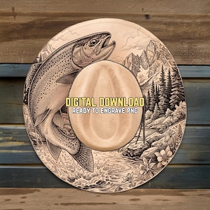 May include: Circular wooden design featuring a detailed illustration of a leaping fish, mountains, and a river scene. The design includes the text "DIGITAL DOWNLOAD READY TO ENGRAVE PNG". Ideal for crafting or outdoor-themed projects.