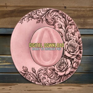 May include: A pink cowboy hat with an intricate floral design. The hat features a detailed pattern of roses and leaves around the brim. Text on the hat reads "DIGITAL DOWNLOAD READY TO ENGRAVE PNG".