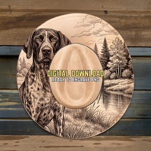 May include: A digital download design featuring a German Shorthaired Pointer dog illustration on a hat. The hat design includes a scenic background with trees, a lake, and the text "DIGITAL DOWNLOAD READY TO ENGRAVE PNG".