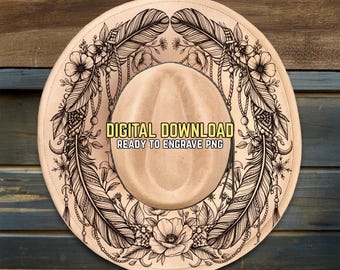 May include: A tan cowboy hat with a decorative feather and floral design. The hat features the text "DIGITAL DOWNLOAD READY TO ENGRAVE PNG". The design includes detailed black line art of feathers, flowers, and hanging beads.