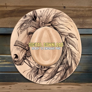 May include: A digitally designed cowboy hat with a horse head and feather graphic. The hat is tan with a light brown brim and features the text "DIGITAL DOWNLOAD READY TO ENGRAVE PNG".