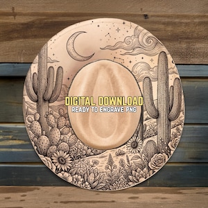 May include: A tan cowboy hat with a desert landscape design. The hat features a crescent moon, stars, clouds, and cacti. The text "DIGITAL DOWNLOAD READY TO ENGRAVE PNG" is printed on the hat.