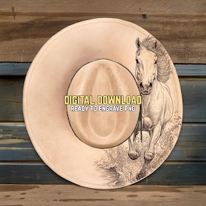 May include: A tan cowboy hat featuring a detailed illustration of a running horse. The hat has a wide brim and a rounded crown. Text on the hat reads "DIGITAL DOWNLOAD READY TO ENGRAVE PNG".
