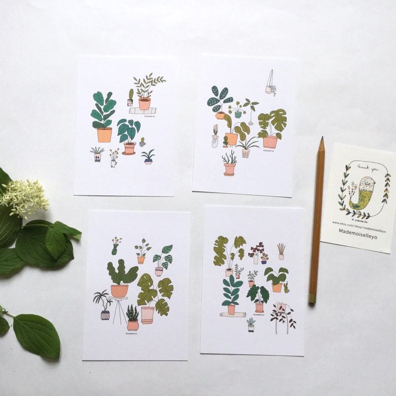May include: Four printable art prints featuring illustrations of potted plants in various styles. Each print has a white background and features a different arrangement of plants in pots. The prints are perfect for adding a touch of nature to any room.