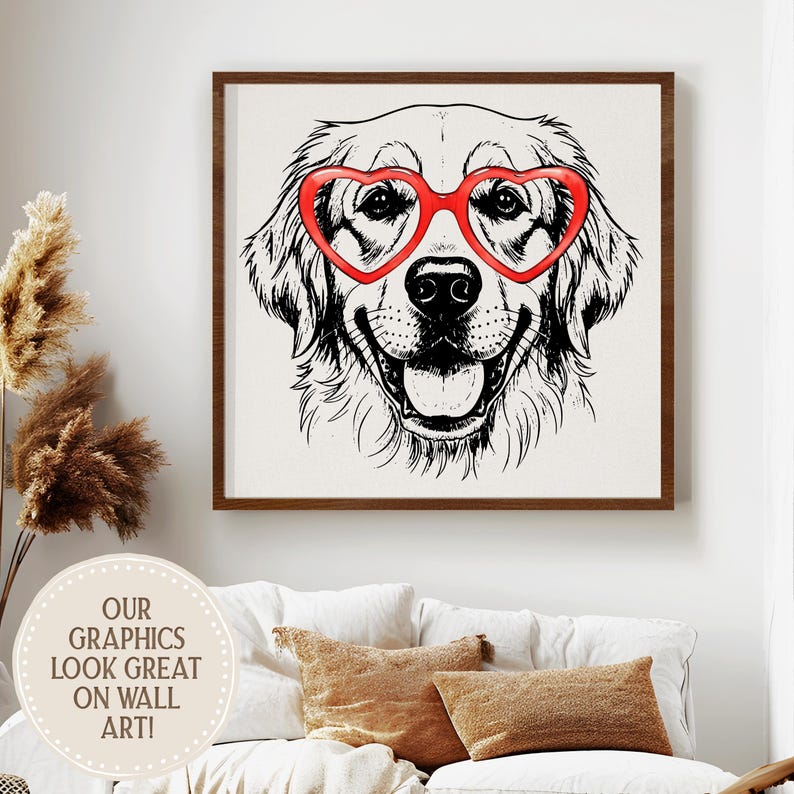 May include: A framed wall art print showing a black and white illustration of a Golden Retriever wearing red heart-shaped glasses. The dog is smiling. The frame is brown. The text "OUR GRAPHICS LOOK GREAT ON WALL ART!" is in a circle at the bottom.