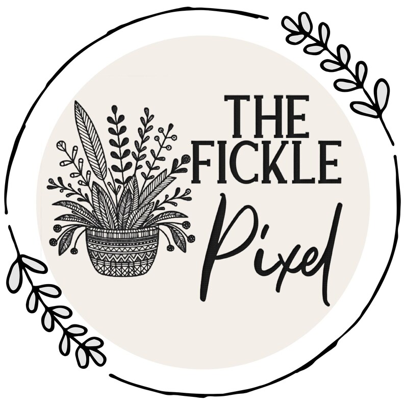 May include: A circular logo with the text "THE FICKLE Pixel" in black. The logo features a potted plant illustration in black and white, surrounded by a black outline and decorative leaves.