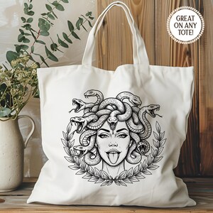 May include: Off-white tote bag featuring a black and white illustration of Medusa with snakes for hair, a tongue sticking out, and a laurel wreath. The text "GREAT ON ANY TOTE!" is in a circle on the upper right.