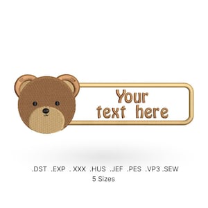 May include: Embroidered design of a brown bear with a beige banner that says "Your text here". The design is available in five sizes and in the following formats: DST, EXP, XXX, HUS, JEF, PES, VP3, and SEW.