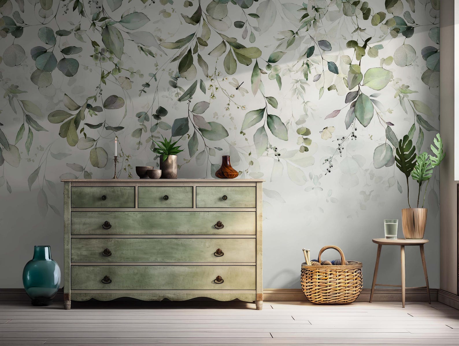papier peint eucalyptus dans une chambre avec commode en bois vert veilli