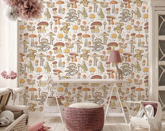 May include: A white wall with a repeating pattern of colorful mushrooms. The wall is in a room with a white table, a pink ottoman, and a white toy stroller.