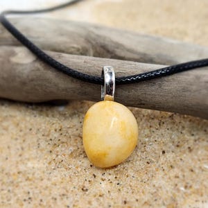 Natural Yellow Quartz Pendant. Handpicked from Lake  Michigan. Includes 18-inch stainless steel chain and black waxed cord.