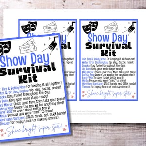 May include: A blue and white "Show Day Survival Kit" print with a theater mask, ticket, and spotlight graphic. The text includes items like hair ties, lip balm, and mini mirror. The phrase "Shine bright, super star!" is also included.