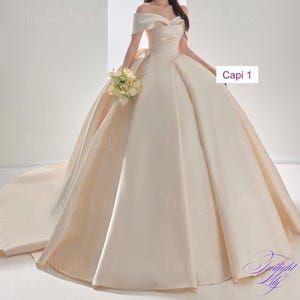 Capi off the shoulder cream satin ballgown wedding dress with drop sleeves