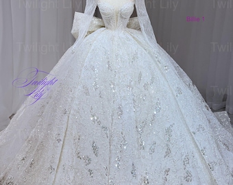 Billie beaded long sleeves sparkly white ballgown wedding dress with bow at back and V slit