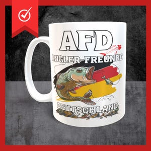 Może przedstawiać: Biały kubek ceramiczny z grafiką czarnej i czerwonej ryby oraz tekstem "AFD Angler-Freunde Deutschland".