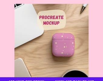 Könnte beinhalten: Ein pinkfarbenes und weiß gemustertes Handyhülle-Mockup für Procreate. Die Hülle liegt auf einer Holzoberfläche mit einem Laptop und einem Stift.