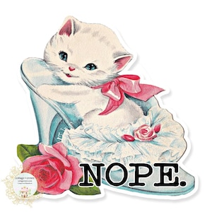 May include: A white kitten wearing a pink bow sits in a blue and white high-heeled shoe. The shoe has a white ruffle trim and the word "NOPE" is printed on the sole.