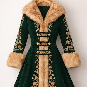 May include: A dark green coat featuring tan faux fur trim along the collar, cuffs, and hem. The coat includes gold-toned toggle closures and intricate gold floral embroidery detailing along the front panels and sleeves on a structured silhouette.