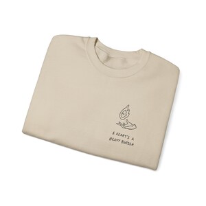 A heart's a heavy burden, Ghibli Quote Sweatshirt image 3