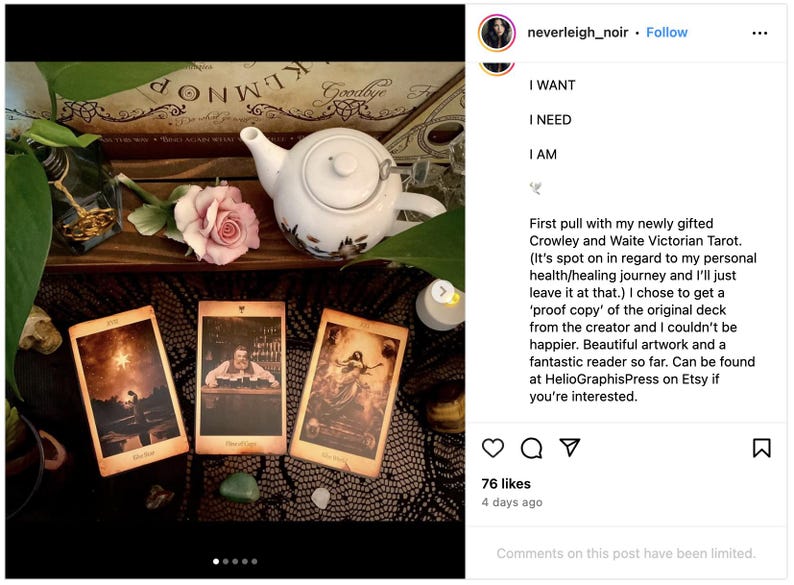 May include: Three tarot cards with dark, detailed illustrations are laid out on a black lace tablecloth. The cards are surrounded by a teacup, a candle, and a rose. The text on the cards reads "The Star", "The Hanged Man", and "The Empress". The caption reads "First pull with my newly gifted Crowley and Waite Victorian Tarot. (It's spot on in regard to my personal health/healing journey and I'll just leave it at that.) I chose to get a 'proof copy' of the original deck from the creator and I couldn't be happier. Beautiful artwork and a fantastic reader so far. Can be found at HelioGraphisPress on Etsy if you're interested."