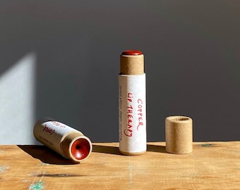 new COPPER LIP THERAPY iron oxide + annatto seed organic lipstick in compostable packaging! (0.15 oz paperboard tube)