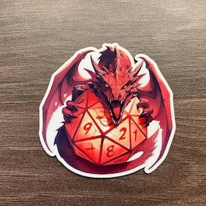 May include: A red dragon with wings outstretched is holding a red twenty-sided die with the numbers 9, 1, 2, 1, 8, and 4 visible.