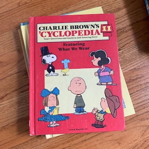 Vintage 1980 Charlie Brown 'Cyclopedia Volume 11: What We Wear - Children's Educational Hardcover Book