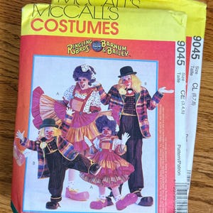 May include: McCall's Costumes pattern featuring Ringling Bros. and Barnum & Bailey circus clown designs. The pattern includes illustrations of colorful clown outfits with ruffles, stripes, and polka dots. The pattern sizes are CL (6,7,8) and CE (3,4,5).