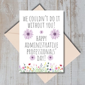 May include: A white card with the text "We couldn't do it without you! Happy Administrative Professionals' Day!" surrounded by purple flowers and a border of colorful flowers.
