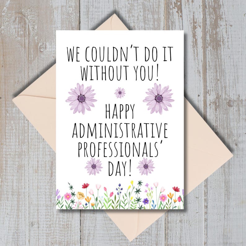 May include: A white card with the text "We couldn't do it without you! Happy Administrative Professionals' Day!" surrounded by purple flowers and a border of colorful flowers.