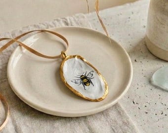 oyster shell bee pendant