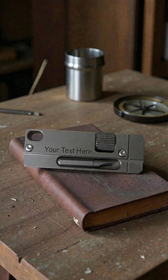 A laser-engraved titanium multi-tool keychain with a working adjustable wrench and screwdriver in a truly minimalist form — the kind of nerdy-useful object that makes engineers do a double-take.