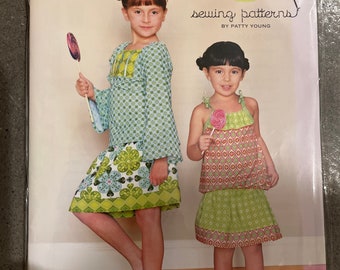 Modkid sewing paper pattern Nina top snd skirt all season sizes 2-7. New. Uncut.